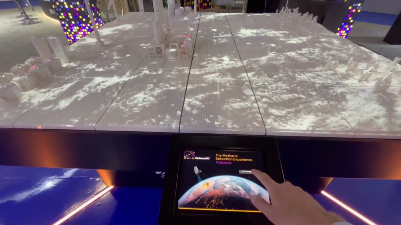 Presenter controls beside the interactive LEGO landscape